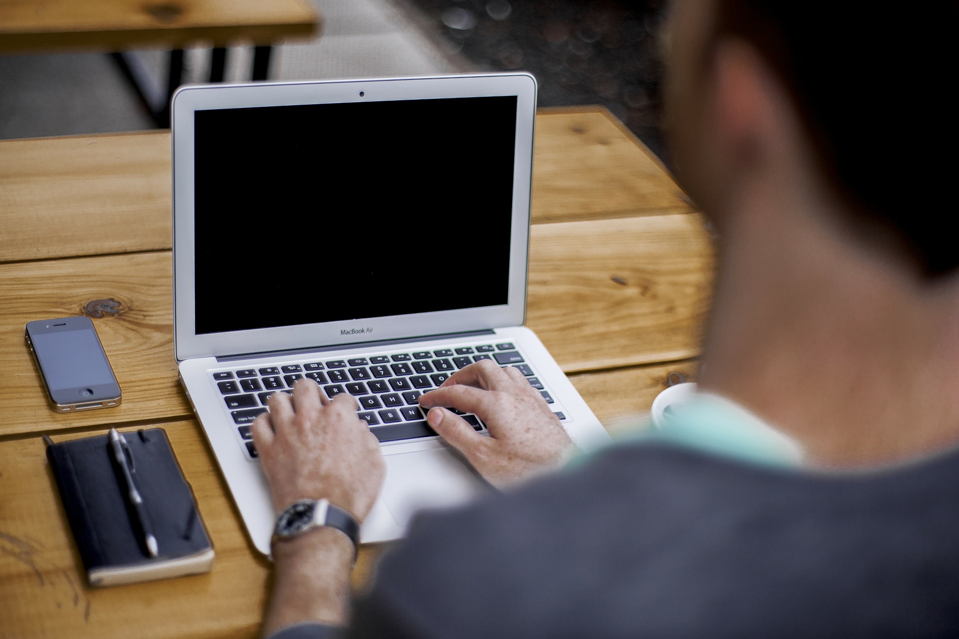 typing on laptop
