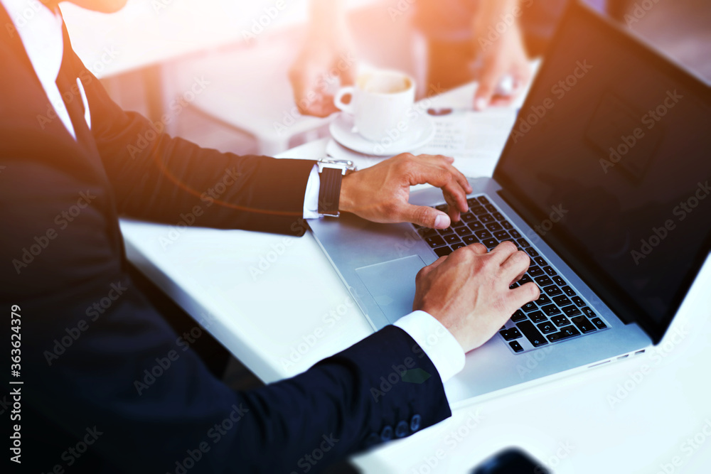 person typing on laptop