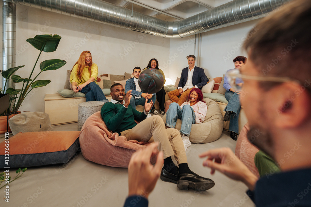 group couches bean bags tossing basketball